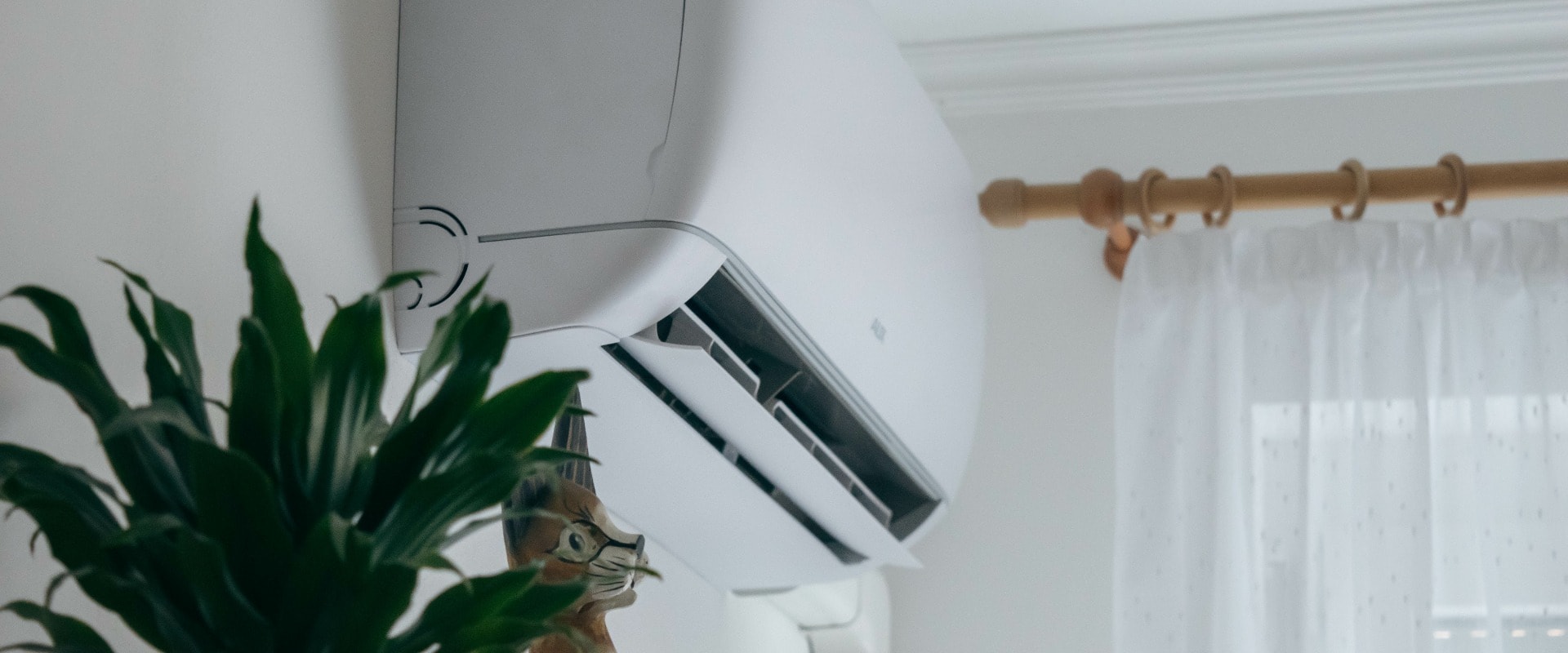 Split air conditioner on a white wall closeup